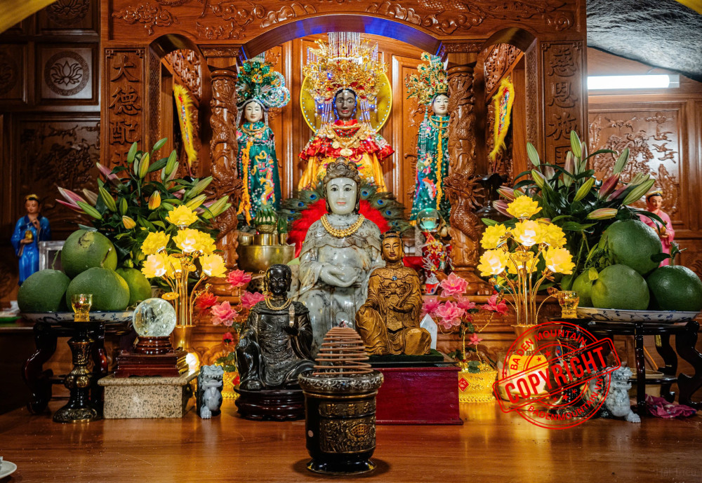 The main altar of Linh Son Thanh Mau (Black Virgin Lady) inside the ancient Ba Pagoda on Ba Den Mountain. Legend of the Black Virgin Lady